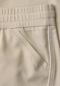 Mid Waist Slim Legs broek in Loose Fit