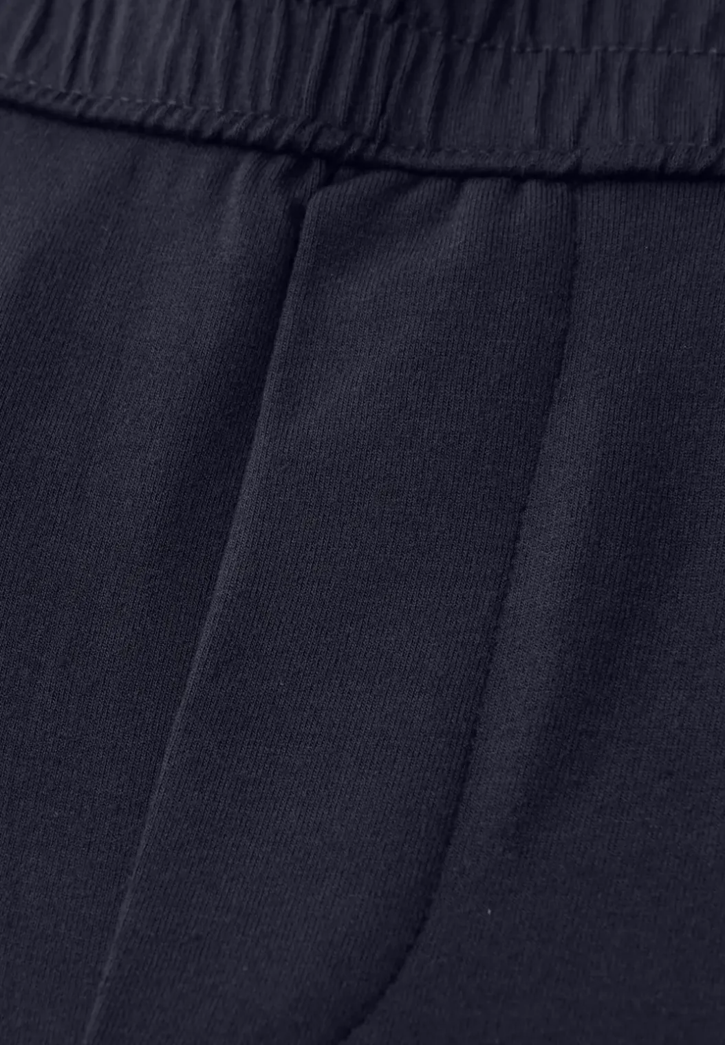 Mid Waist Slim Legs broek in Loose Fit