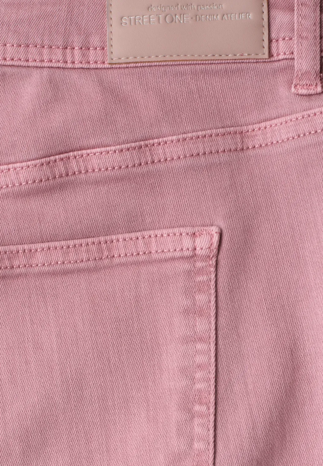Mid Waist taps toelopende jeans in een Loose Fit
