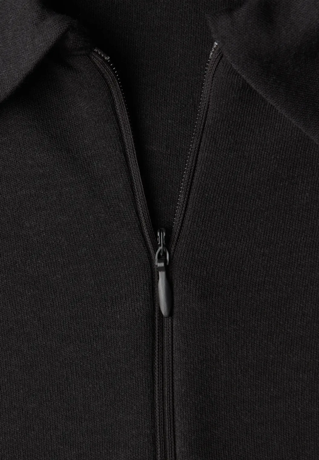 Poloshirt met rits