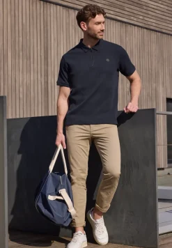 Poloshirt met rits en structuur