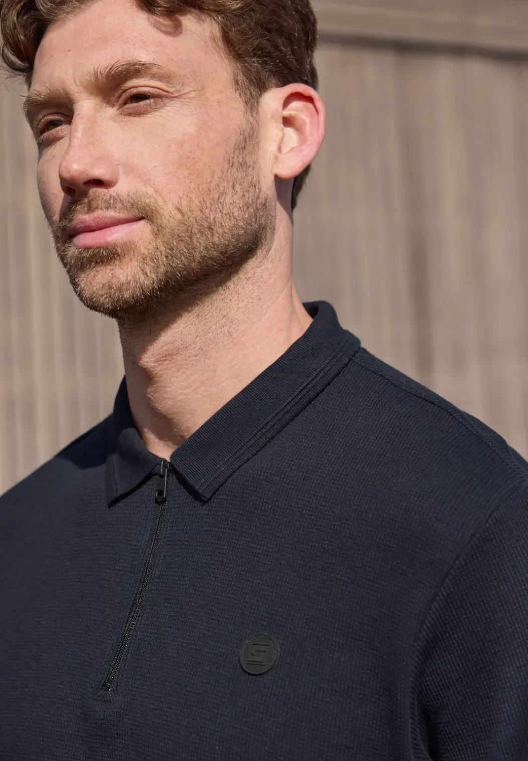 Poloshirt met rits en structuur