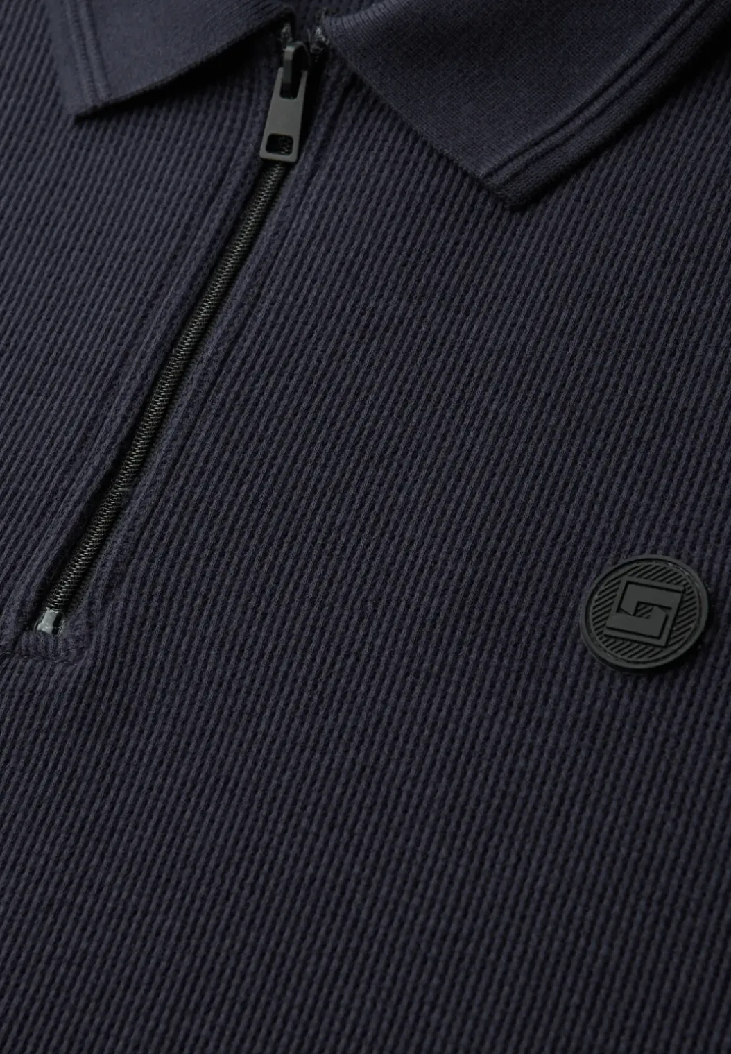 Poloshirt met rits en structuur