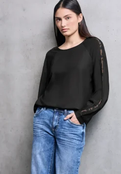 Raglan blouse met getapete details