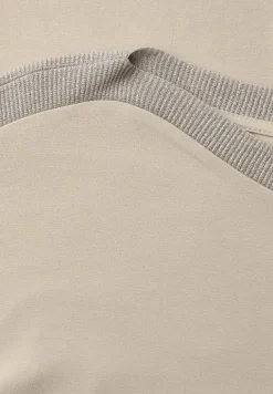 Shirt met hangende schouder en glitter