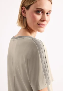 Shirt met hangende schouder en glitter