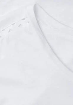 Shirt met overhangende schouder en decoratieve tape