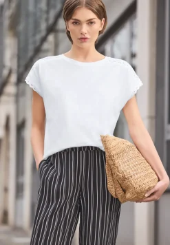 Shirt met overhangende schouder en decoratieve tape