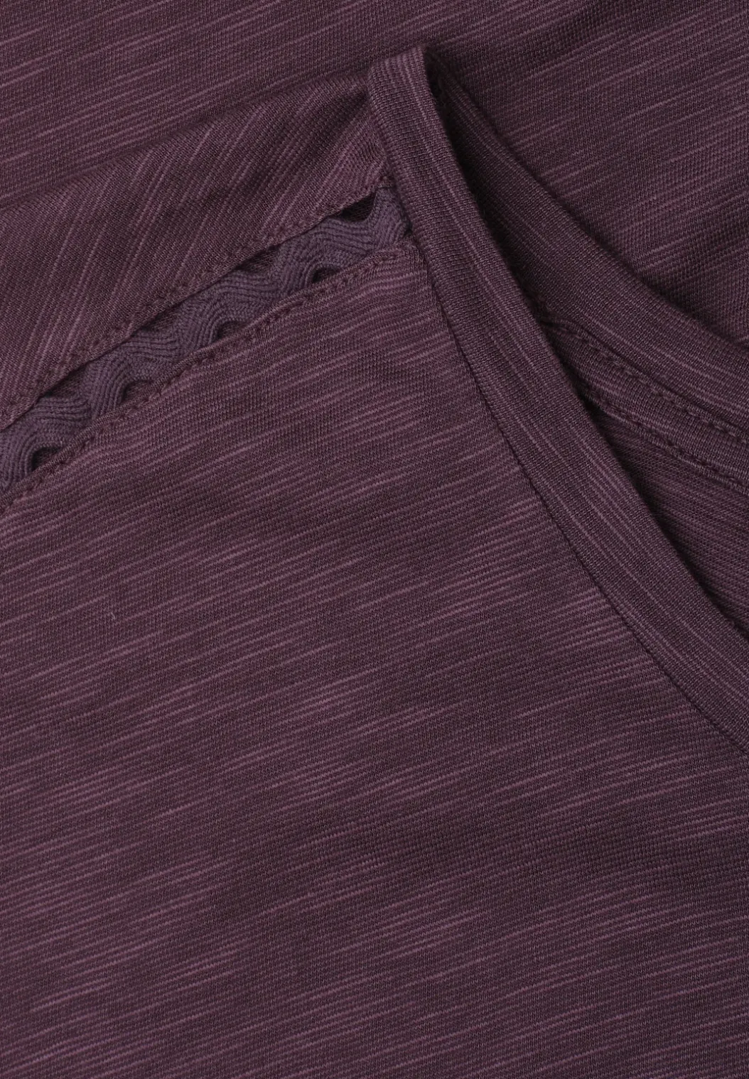 Shirt met overhangende schouder en decoratieve tape