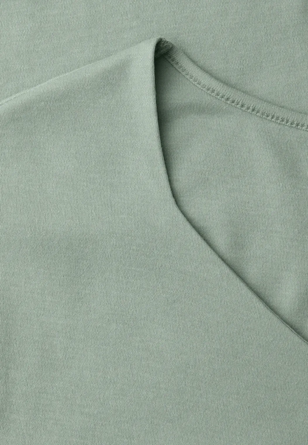 Shirt zonder mouwen met diamanten halslijn