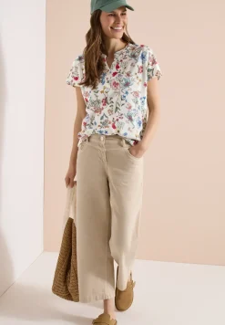 Shirt met gespleten hals en knoopdetails