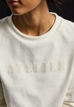 Shirt van fijn ribfluweel met tekst