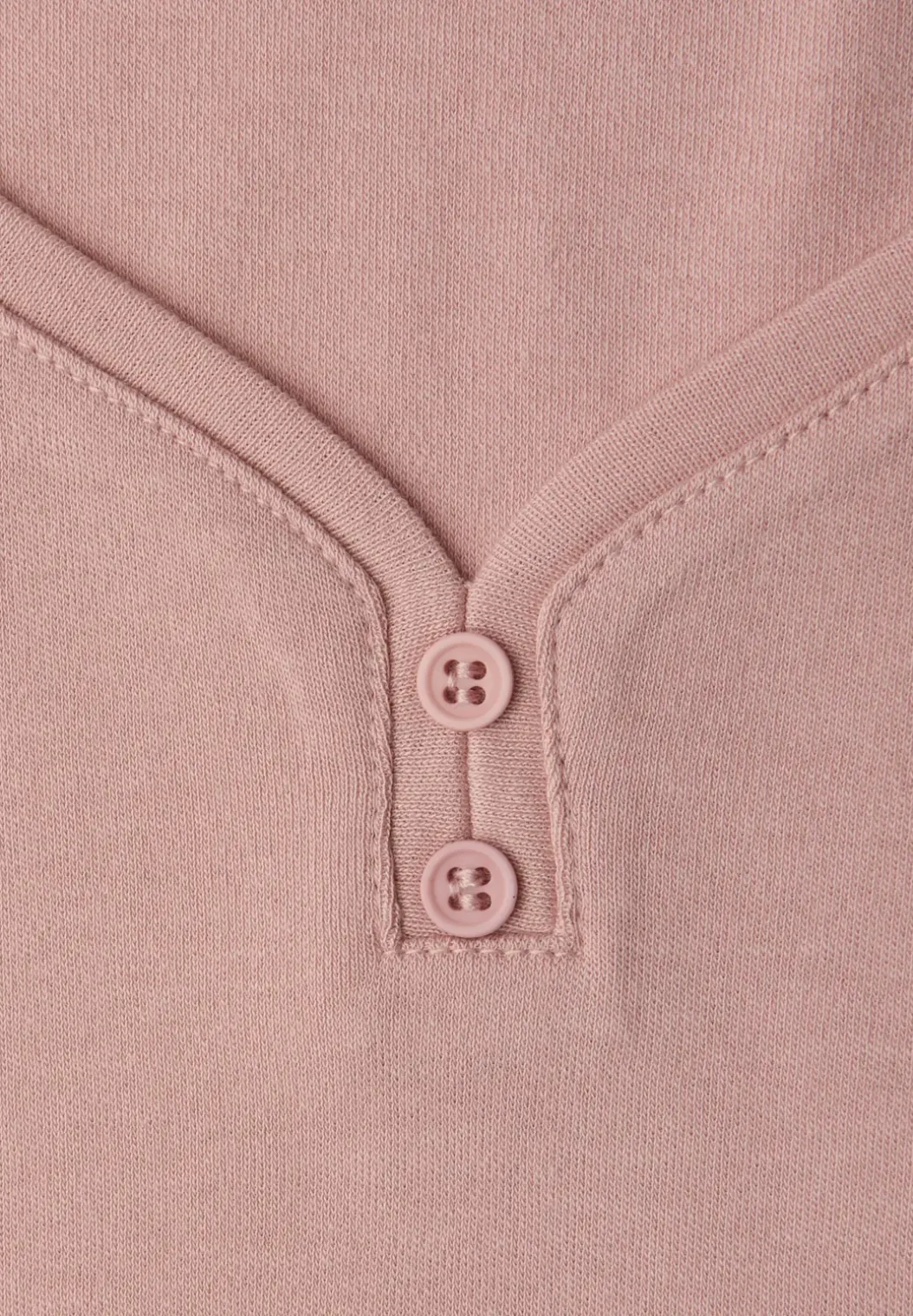 Top met knoopdetail