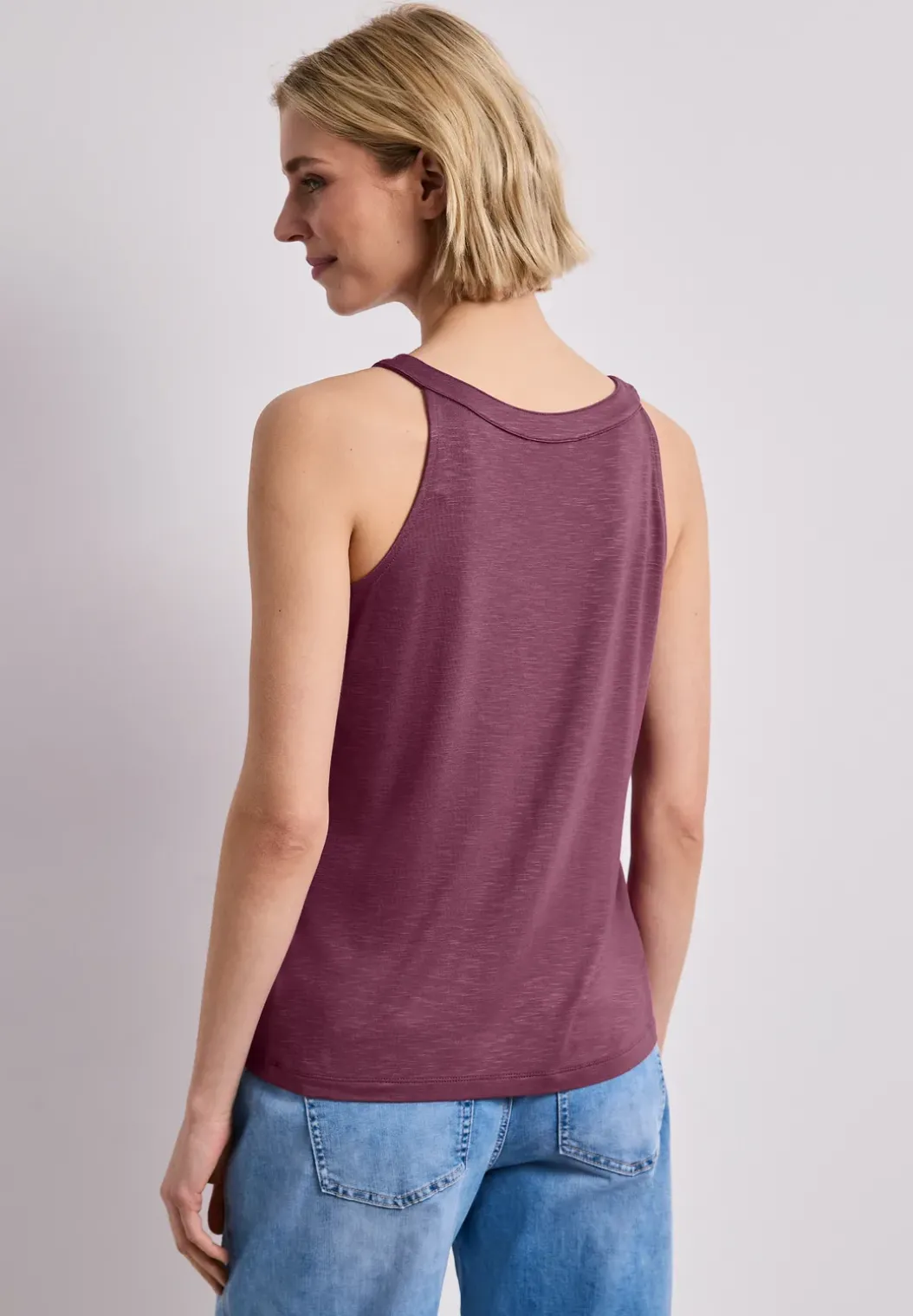 Top met V-hals en decoratief detail