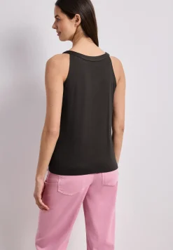 Top met V-hals en decoratief detail
