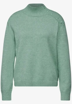 Trui met knoopdetail