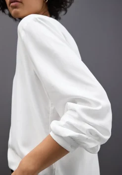 Tuniek met gespleten hals