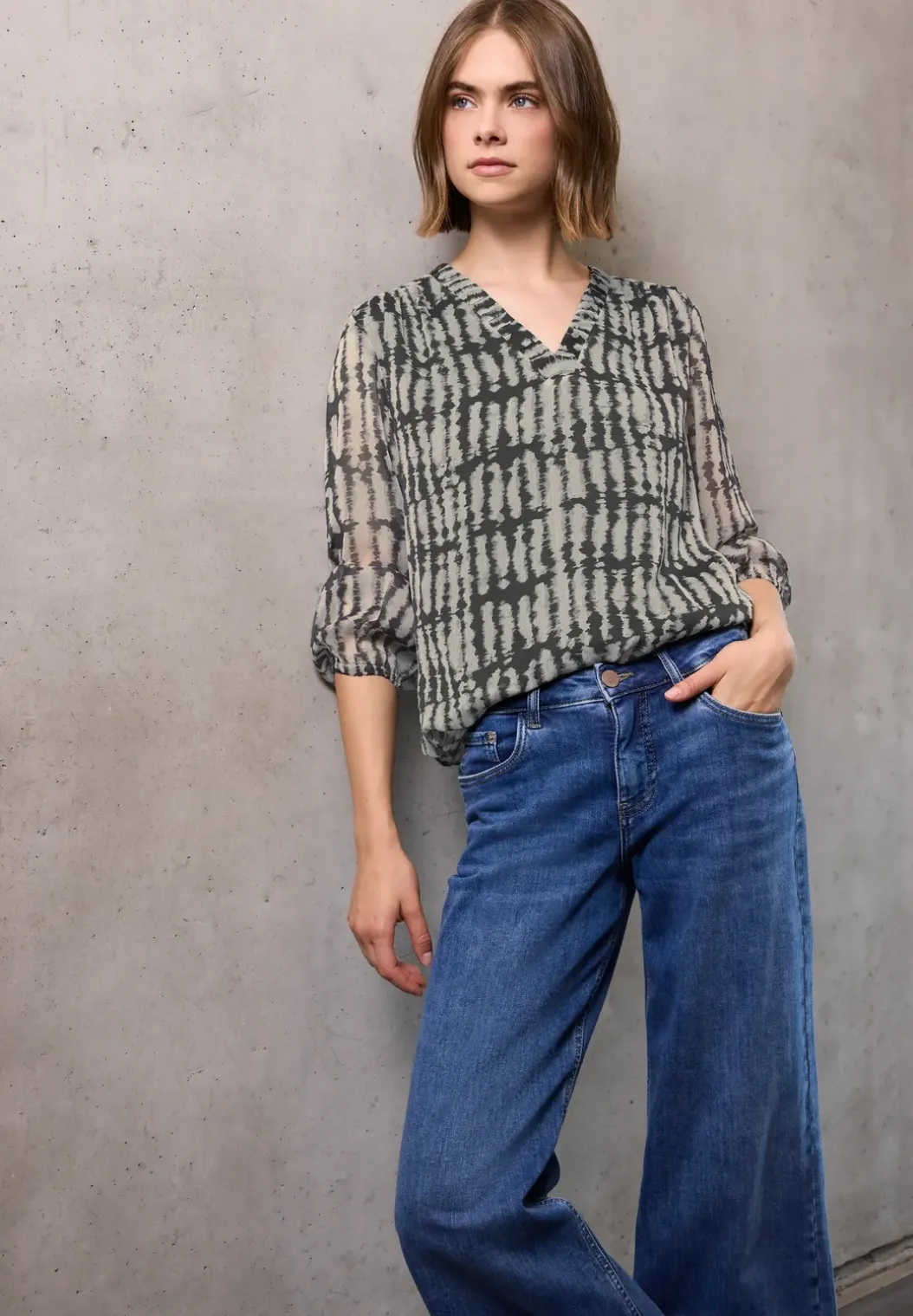 Tuniek van chiffon met V-hals