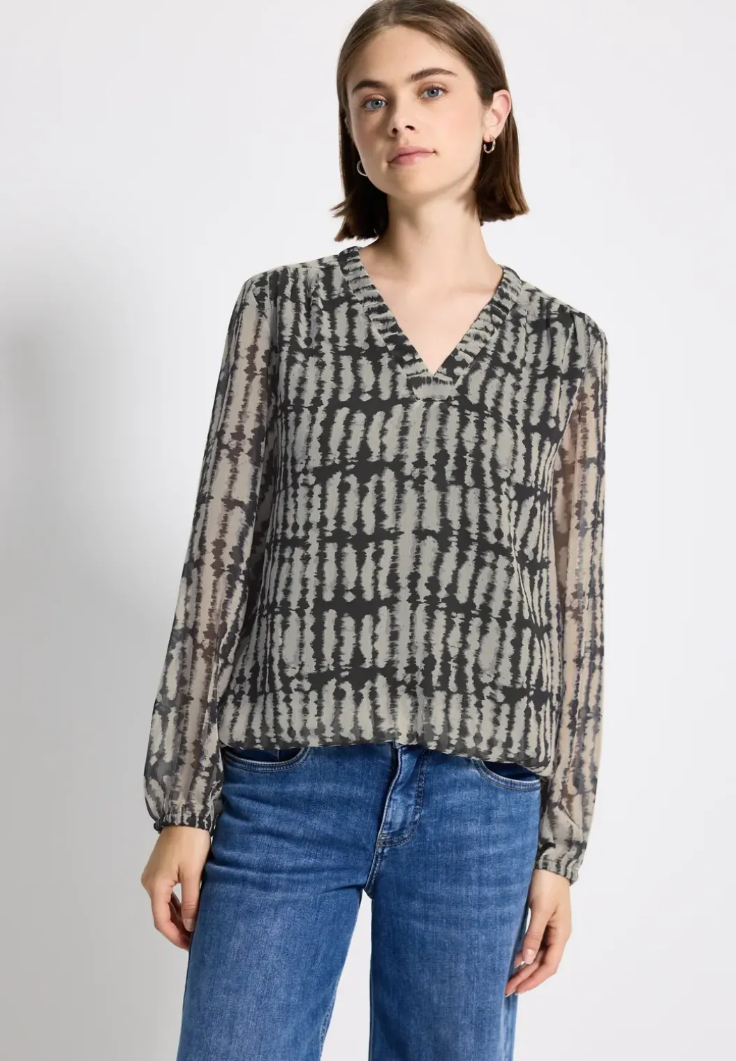 Tuniek van chiffon met V-hals