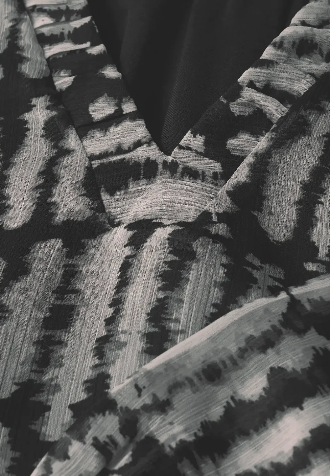 Tuniek van chiffon met V-hals