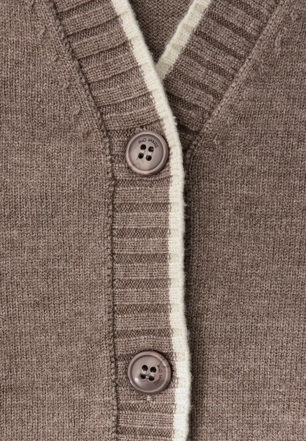 Vest met contrasterende details