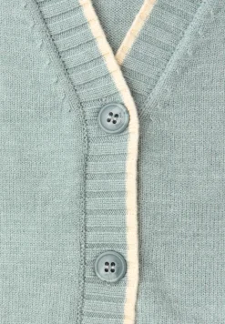 Vest met contrasterende details
